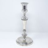 A George V silver candlestick, by Elkington & Co, hallmarks London 1921, height 23cm, loaded base