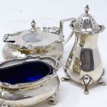 A set of George V silver cruets, with blue glass liners, by William Hutton & Sons Ltd, hallmarks