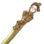 A French gilt-bronze paper knife, circa 1900, the handle in the form of a lady's head with carved