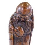 A Chinese carved bamboo figure of Shung Lau holding an eternal peach, height 40cm