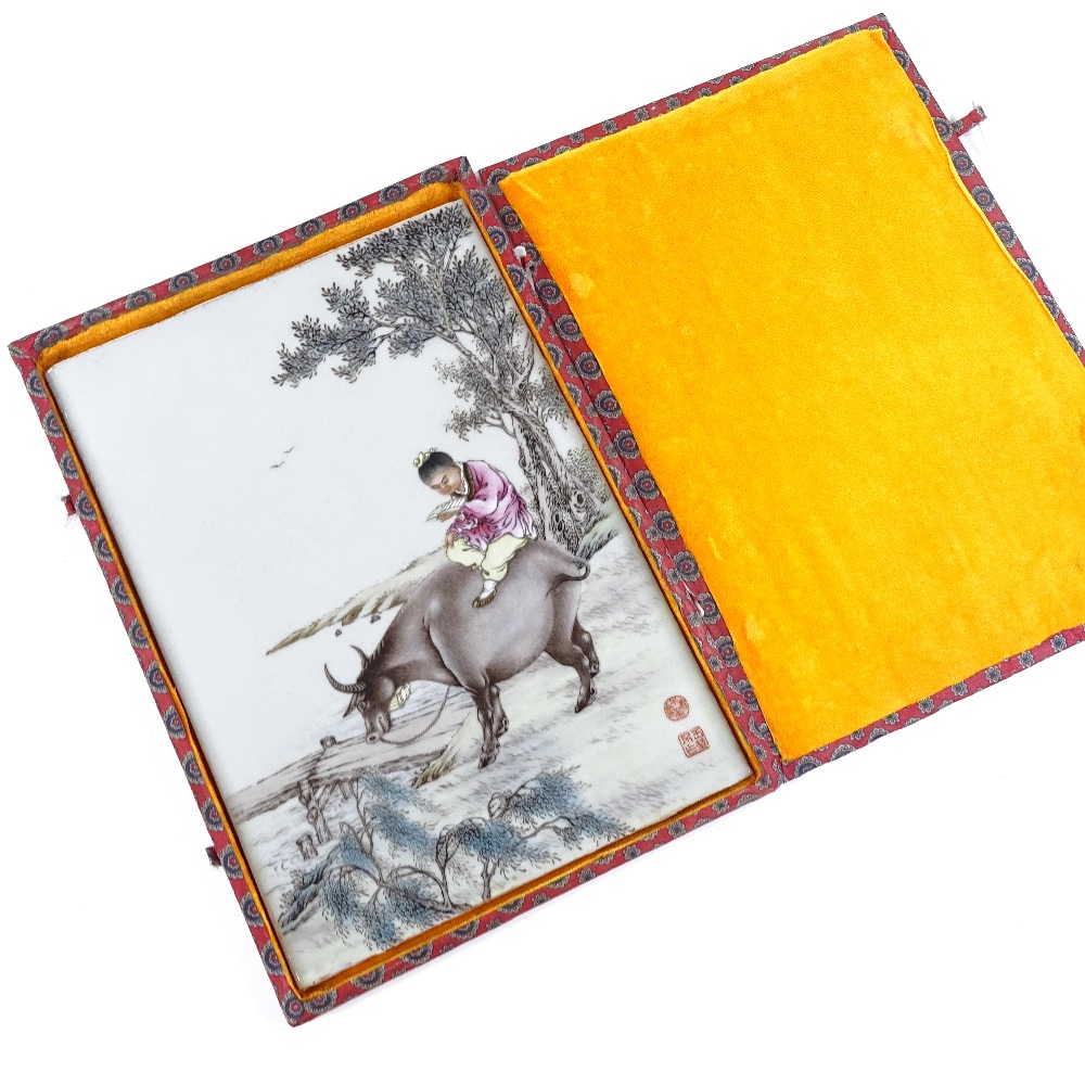 A Chinese porcelain plaque with hand painted scene depicting a figure riding a water buffalo, - Image 3 of 3