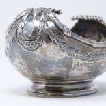 An Edwardian silver boat-shaped dish, with relief embossed swag decoration, by Daniel and John