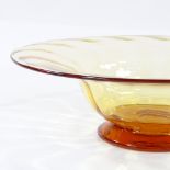 A Whitefriars large ribbed glass bowl, gold/amber designed by Barnaby Powell in 1929, diameter 31cm