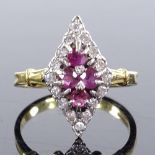 An 18ct gold ruby and diamond cluster lozenge panel ring, panel height 18.3mm, size N, 4.6g