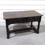 An 18th century oak serving table with 2 carved frieze drawers, turned supports and H-shaped