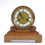 A Victorian light oak drum-cased mantel clock, on moulded base, enamel dial and 8-day movement