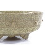 A Chinese ge crackle glaze censer with relief moulded frieze, diameter 16cm, height 7cm