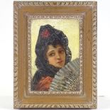 19th/20th century oil on canvas, portrait of a Spanish girl with a fan, indistinctly signed, 13" x