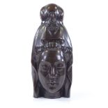 A patinated bronze Buddha head, height 30cm