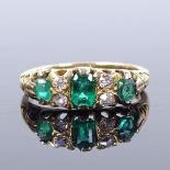 An 18ct gold 7-stone emerald and diamond half-hoop ring, with engraved scrollwork shoulders, setting