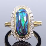 An 18ct gold Australian black opal and diamond cluster ring, long cabochon opal approx 2.35ct,