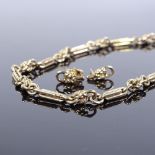 A 9ct gold bar and rope twist link Albert chain, together with a pair of matching earrings, chain