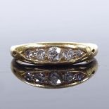 An 18ct gold graduated 5-stone diamond ring, total diamond content approx 0.3ct, setting height 4.