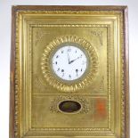 An early 19th century Austrian cabinet clock, enamelled dial in textured brass bezel, mounted in