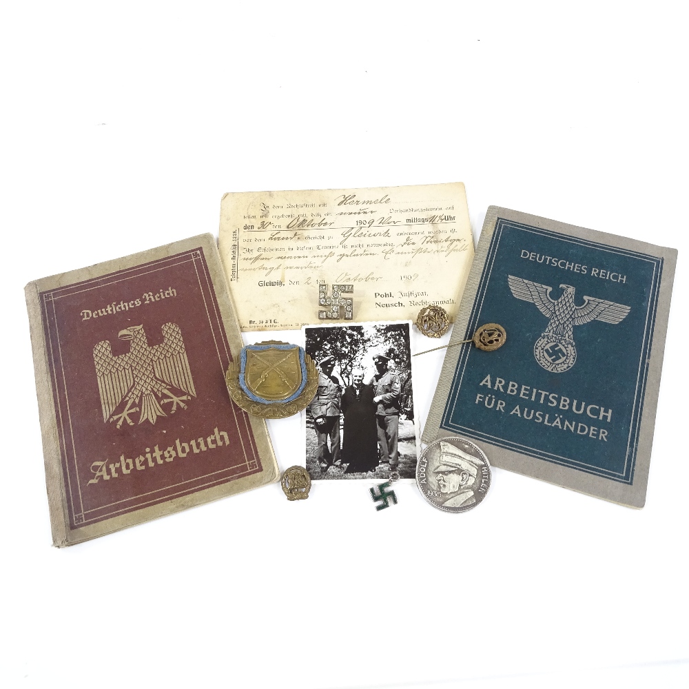 2 Second War Period German Workers' books, badges and coin