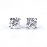 A pair of 18ct white gold 1ct solitaire diamond earrings, with stud fitting, each diamond approx 0.
