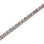 A 9ct gold diamond tennis line bracelet, total diamond content approx 1ct, bracelet length 19cm,