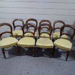 A set of 8 Victorian walnut balloon-back dining chairs