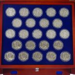 The John F Kennedy uncirculated US Half Dollar collection in wooden cabinet