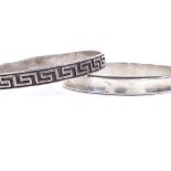 A Danish sterling silver bangle of plain form, maker's marks RS, band width 9.1mm, internal diameter