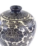 A black and white sgraffito decorated baluster vase, height 37cm