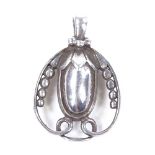 A Georg Jensen Danish sterling silver acorn pattern pendant, in openwork stylised setting, model no.