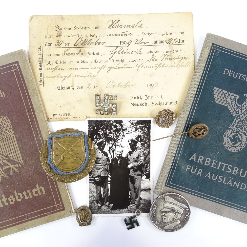 2 Second War Period German Workers' books, badges and coin - Image 2 of 3