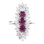 An 18ct white gold ruby and diamond cluster cocktail ring, total diamond content approx 1ct, setting