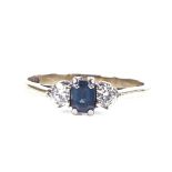 A 9ct gold 3-stone sapphire and diamond ring, setting height 4.8mm, size K, 1.6g