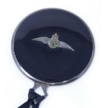 An unmarked silver-framed RAF sweetheart black enamel pocket mirror, diameter 5.5cm