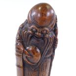 A Chinese carved bamboo figure of Shung Lau holding an eternal peach, height 40cm