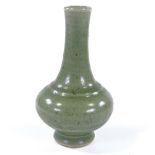 A Chinese celadon green glaze porcelain narrow-necked vase, height 16cm