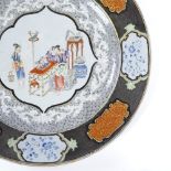 A Chinese porcelain plate, with hand painted central panel in gilded border, diameter 23.5cm