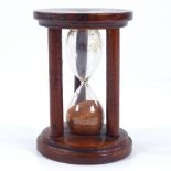 A Victorian Mauchline Ware egg timer, depicting Derwentwater, height 7cm