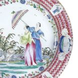 A Chinese famille rose porcelain charger, hand painted enamel ladies in gardens, diameter 39cm