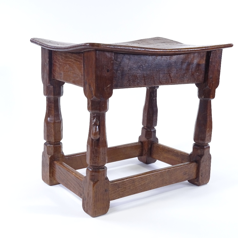 Robert Thompson (Mouseman), a burr-oak dish-topped joint stool, circa 1930, with bulbous octagonal