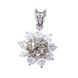 A 14ct white gold brownish and colourless diamond cluster flowerhead pendant, central stone approx