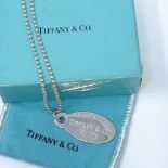 A sterling silver Tiffany & Co of New York Return to Tiffany dog tag necklace, pendant height