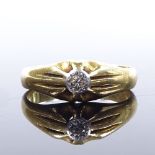 An 18ct gold solitaire diamond gypsy ring, diamond approx 0.08ct, setting height 7.5mm, size S, 6.3g