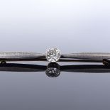 An unmarked gold 0.5ct solitaire diamond bar brooch, brooch length 61.5mm, 5.1g