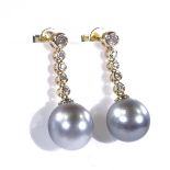 A pair of 14ct gold cultured Tahitian pearl and diamond drop earrings, total diamond content