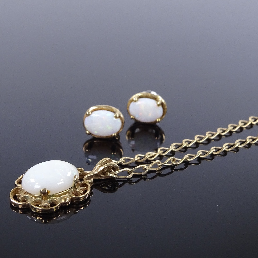 A 9ct gold cabochon opal demi-parure, comprising necklace and stud earrings, necklace length 51cm,