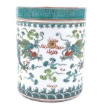 A Chinese porcelain cylindrical box and cover, with green painted dragon decoration, height 11cm,