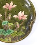 A Continental Majolica pottery 3-handled bowl with relief moulded lily flower designs, diameter 23cm
