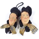 A pair of Laurel and Hardy pressed cloth covered novelty bottle stoppers