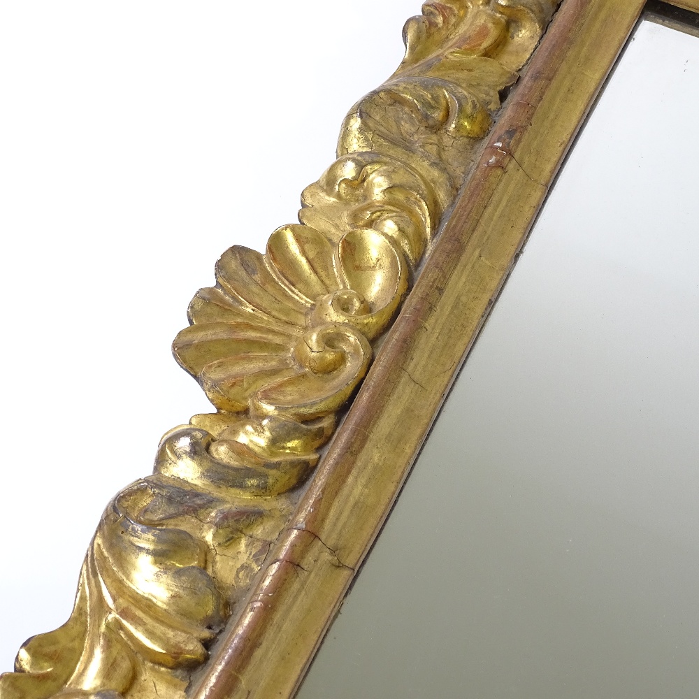 A 19th century Florentine carved acanthus giltwood-framed wall mirror, overall dimensions 98cm x