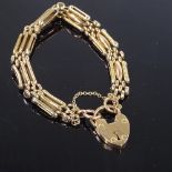 A 9ct gold heart-lock gatelink bracelet, with textured edge panels, maker's marks AC Co, bracelet