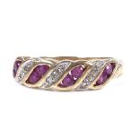 A 9ct gold ruby and diamond half-hoop ring, setting height 4.9mm, size K, 2g