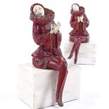 A pair of Art Deco painted spelter and marble harlequin clown design bookends, height 15cm