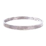 A Danish sterling silver bangle, of plain form, maker's marks FK, band width 6mm, internal